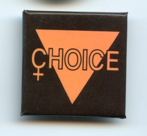 This button expresses Lesbian support for the reproductive justice movement.